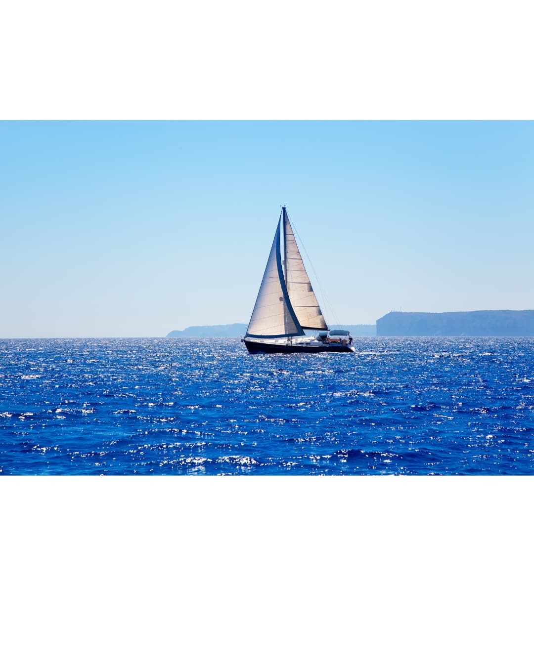 Friends enjoying a day on a sailing boat.